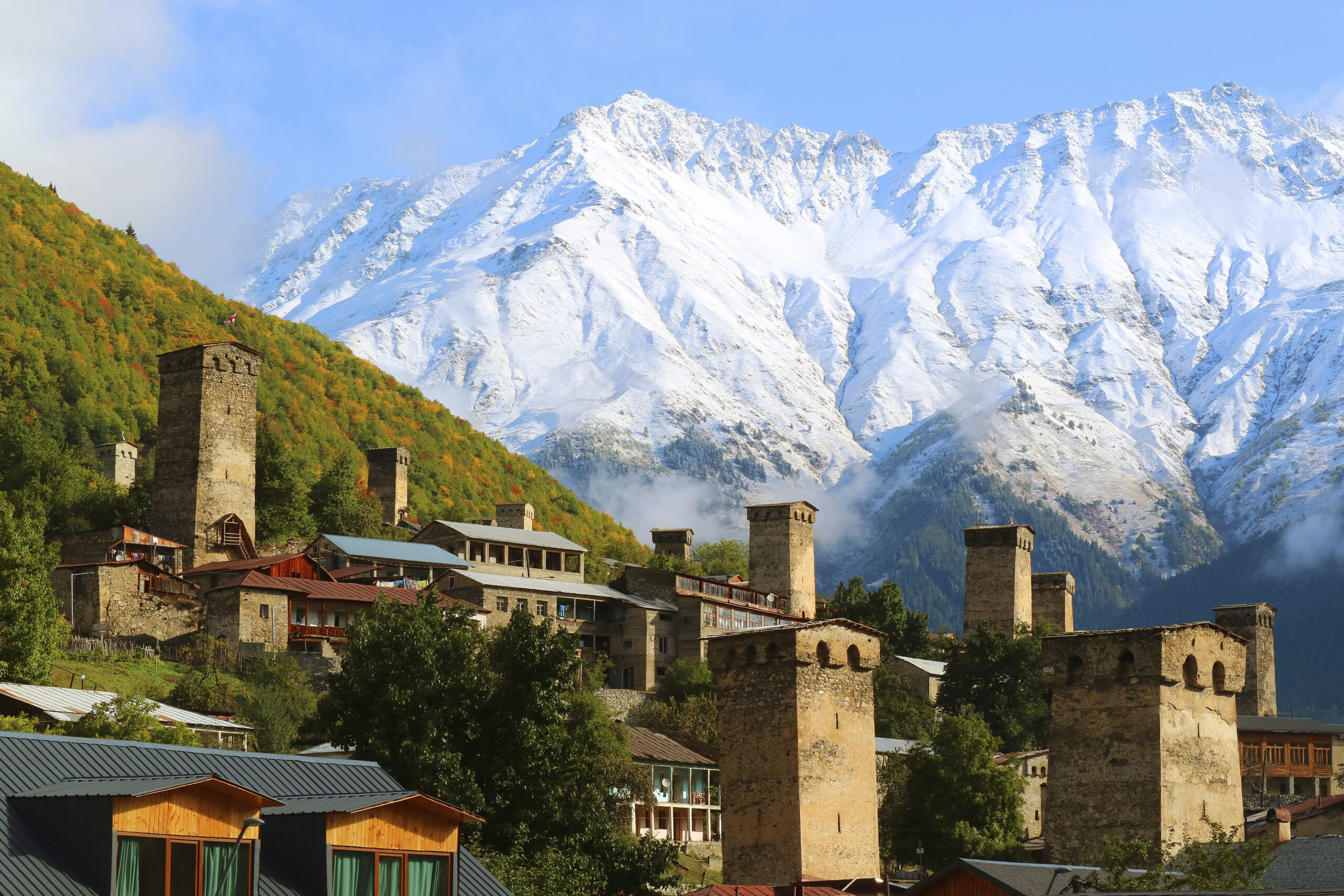 Stunning View of Medieval Svan Tower-houses against the Snow-cap